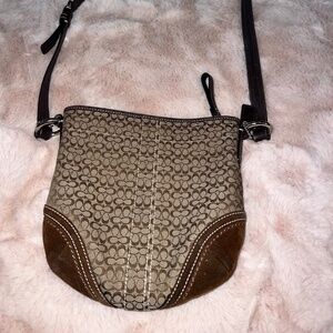 Brown, leather Coach crossbody bag.